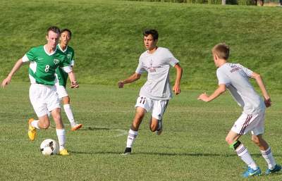 Caleb Reagor, left, in action with Thunder Ridge soccer team.