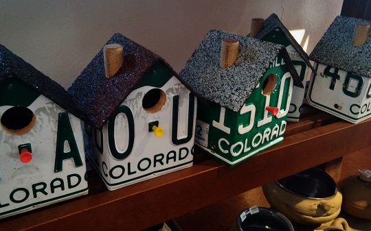 Handcrafted birdhouses by local business Barefoot Birdhouses.
