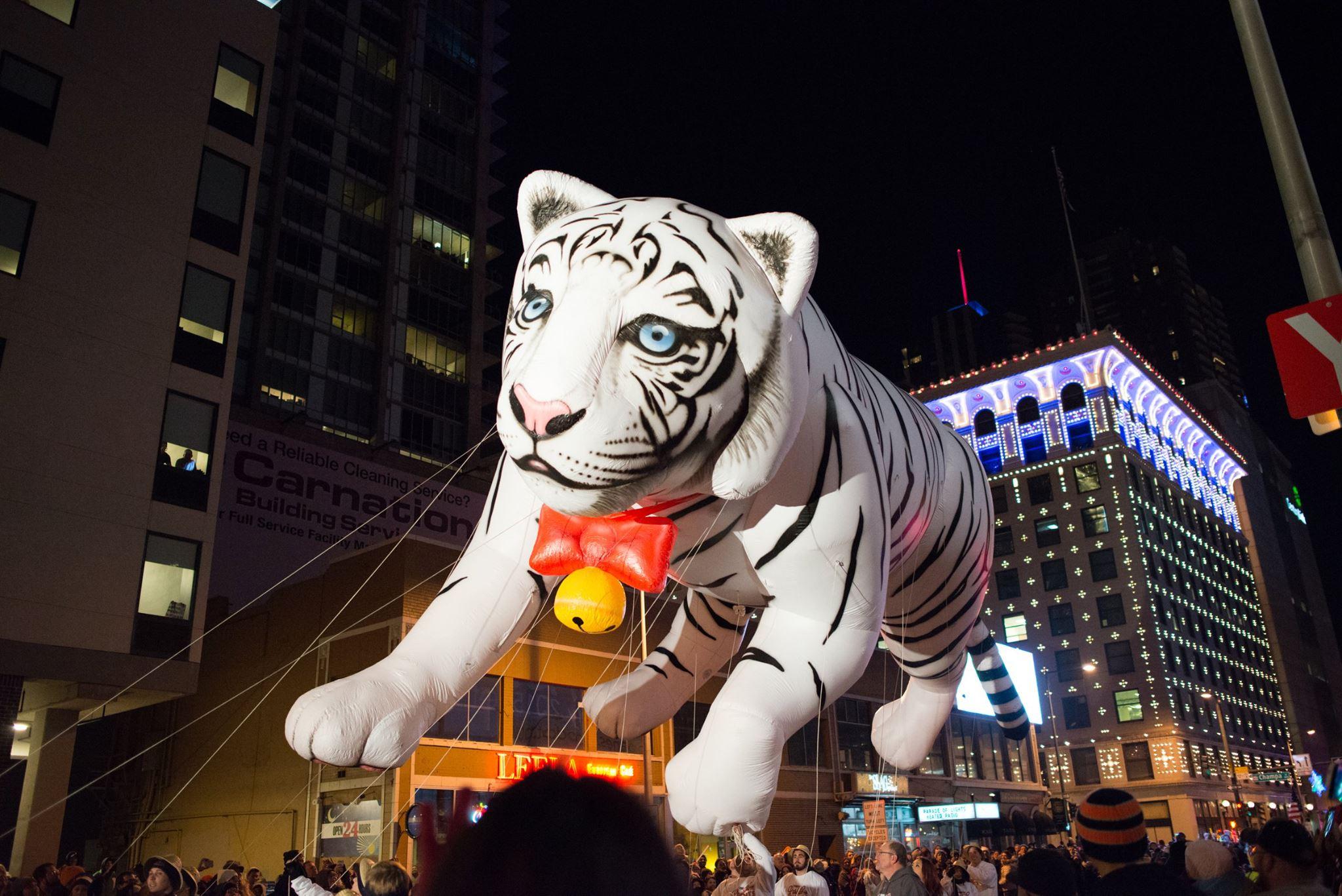 A snow tiger floats through the air at the 9NEWS Parade of Lights on Friday, December 4th, 2015 