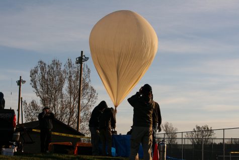 EOSS Fills ACC DemoSat team balloon with hydrogen before the launch in Eaton Colorado on April 9 2016