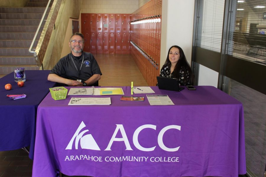 Bill Spialek, emergency medical service faculty member, and Danielle Staples, associate dean of health, mathematics and sciences, welcome students with maps, snacks and smiles on Tuesday, Jan. 16, 2018 at Arapahoe Community College in Littleton, Colo. Faculty and administrators take turns greeting students at the north and west entrances of the main building during the first week of the spring semester. 