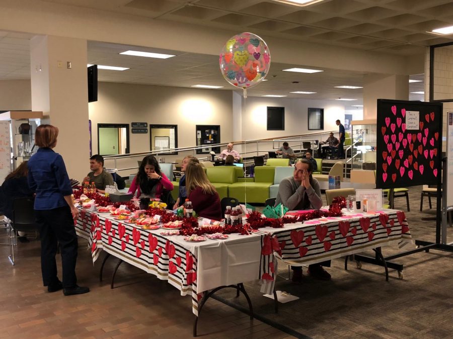 Members of Phi Theta Kappa, Student Government and the Pre-Health Society take donations in exchange for baked good and candygrams on February 14, 2018, at the main campus of Arapahoe Community College in Littleton, Colo. All proceeds from the fundraiser will be used to purchase jackets for the homeless through Project Homeless Connect.