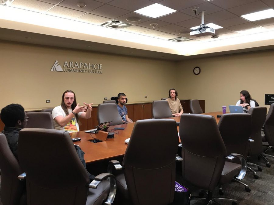 Student Government Associate Board Meeting, Thursday April 26, 2018 at ACC. In the far left, Treasurer John Sackey, to his right, Secretary Scott Bright. In the middle,  Aditya Sriram; middle right, Ryan Holmes, and to the right is President of Student Government, Camila Monroe.