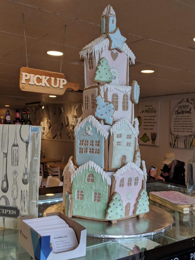 A gingerbread cookie house on display at Born2Bake bakery cafe
