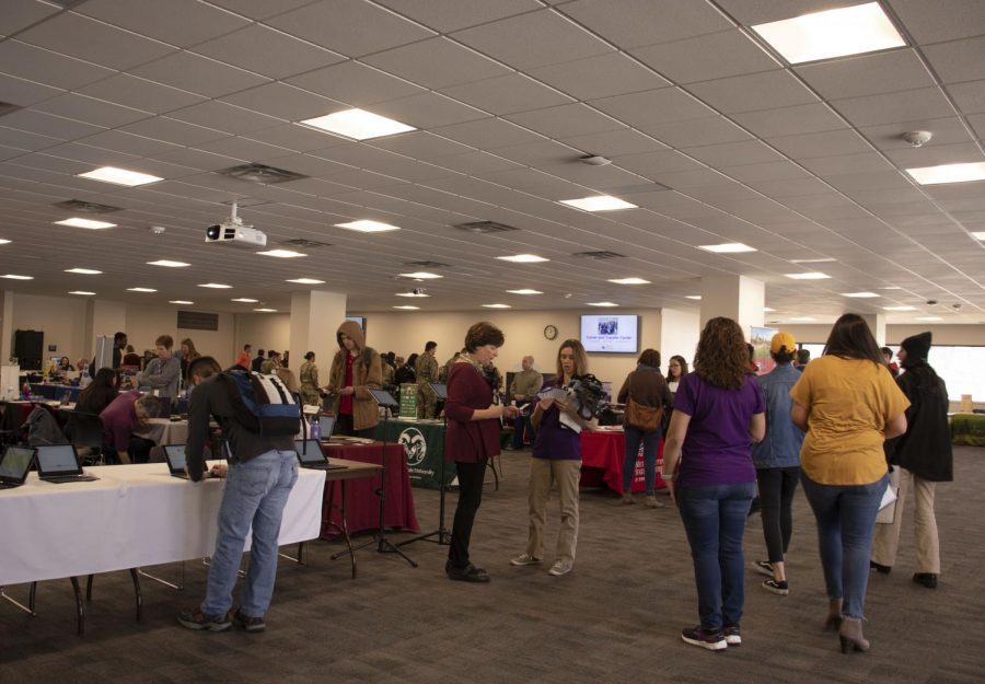 ACC students and staff gather at the Spring Transfer Fair to talk with transfer advisors, Tuesday, Feb 26, 2019. Local and National four-year universities to collect information about transfer options.