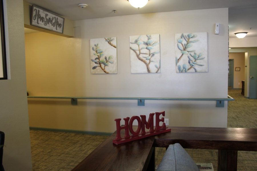 What guests see right when they walk inside the Libby Bortz Assisted Living Center. The word “Home” and phrase “Home Sweet Home” is placed. Making the guests feel welcome and at home. March 5, 2019. 