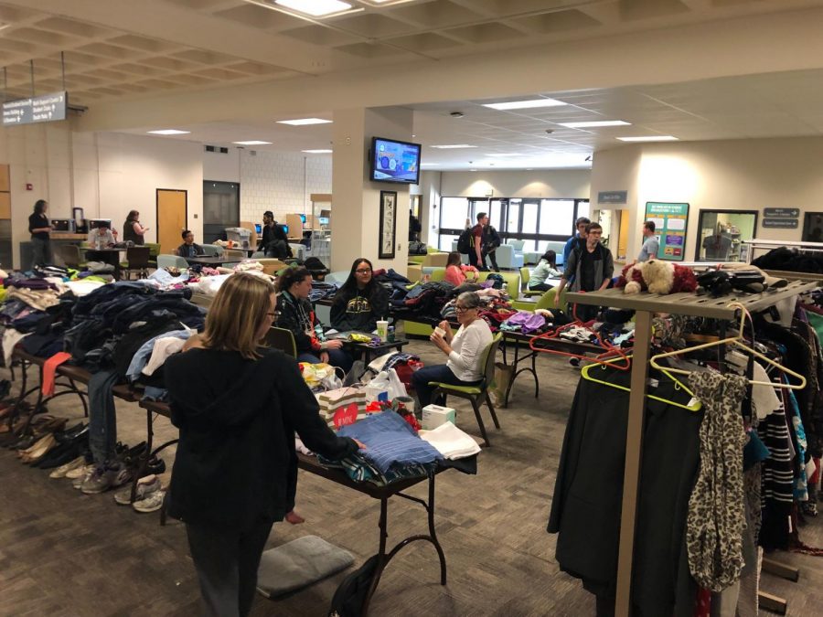 Staff and student volunteers at the Sustainability Club Clothing Swap at Arapahoe Community College in Littleton, Colo. on Wednesday, March 27, 2019.