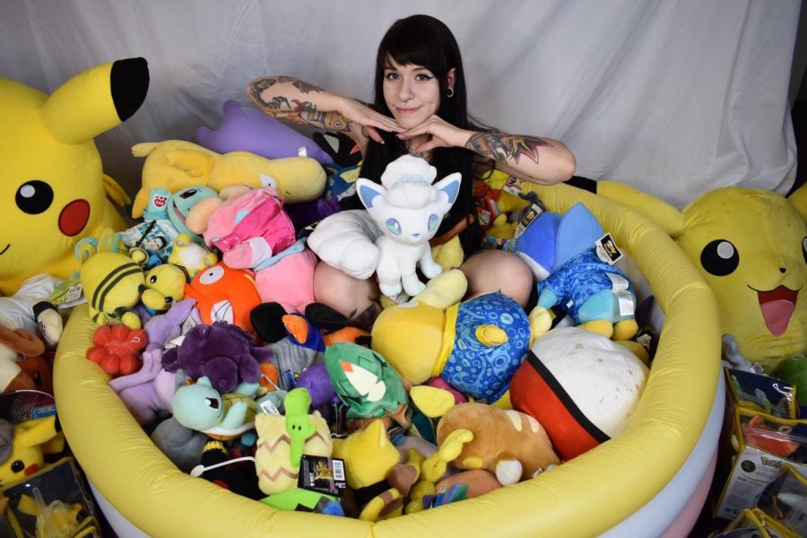 Marrissa Cloutier, aka PokePrincxss, showing off a small part of her massive Pokemon collection at her home in Colorado Springs, Colo., on Sept. 1, 2019.