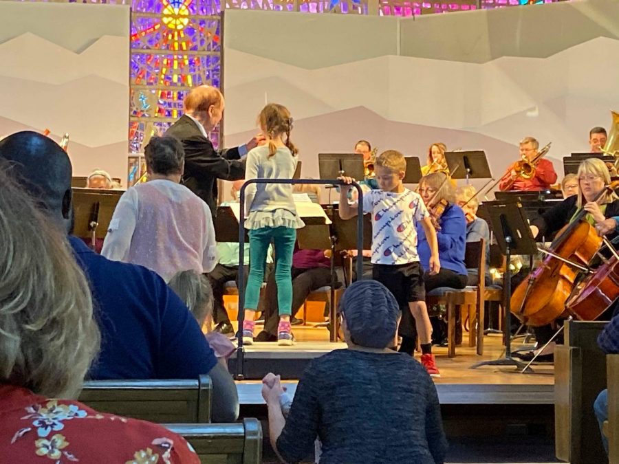 Child Playing Conductor at Littleton Symphony