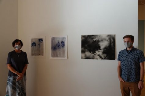 Angela Faris Belt and Nathan Abels pictured next to pieces for their art from “The Nascent” and “Tent Shadows.”