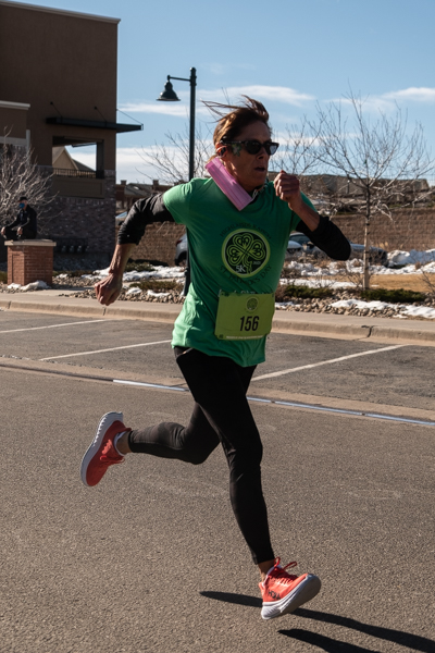 One of the St.Patricks day 5k Runners on the final push to the finish line.