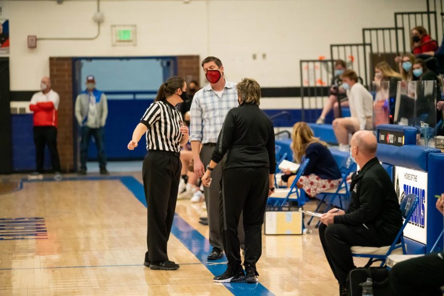 Head coaches from the Highlands Ranch and Cherry Creek discuss the penalty call made by the referees at Highlands Ranch High School on March 9th, 2021.