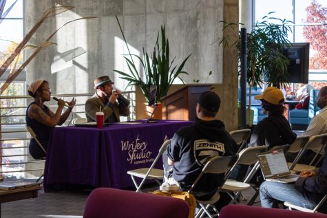 Ahja Fox (left of the table) speaks to the audience at ACC’s Library.