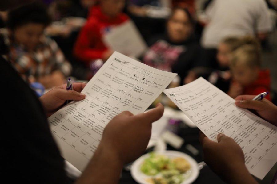 Participants play Bingo at the First-Generation Celebration at the Arapahoe Community College, Littleton Campus on Nov. 7, 2022. Once participants completed a row they could turn in their card to enter for a chance to win one of eight $500 scholarships. 