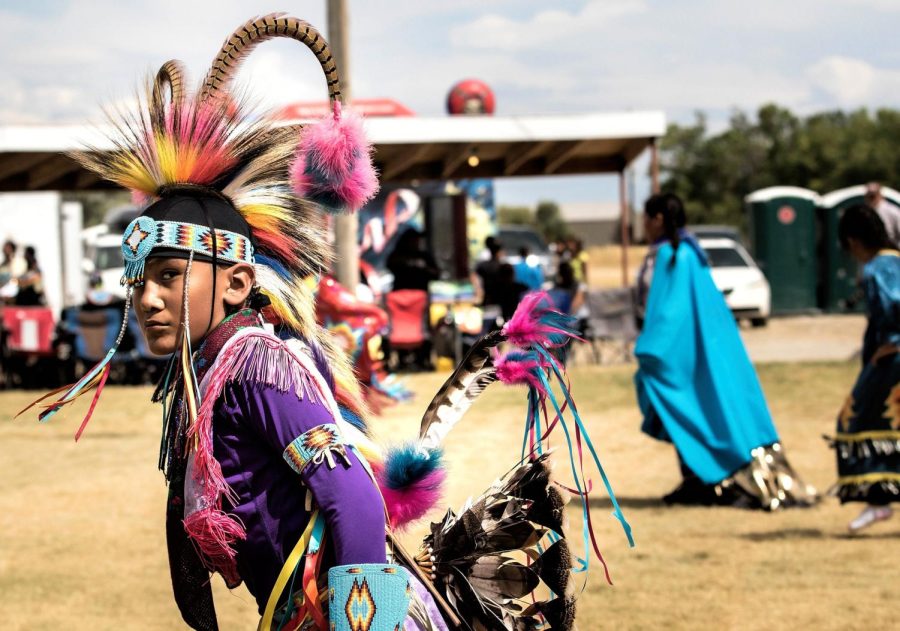 A member of the Arapahoe tribe in traditional headdress.