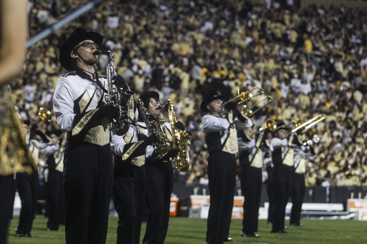 The University of Colorado Marching Band steps onto the field and plays during halftime.