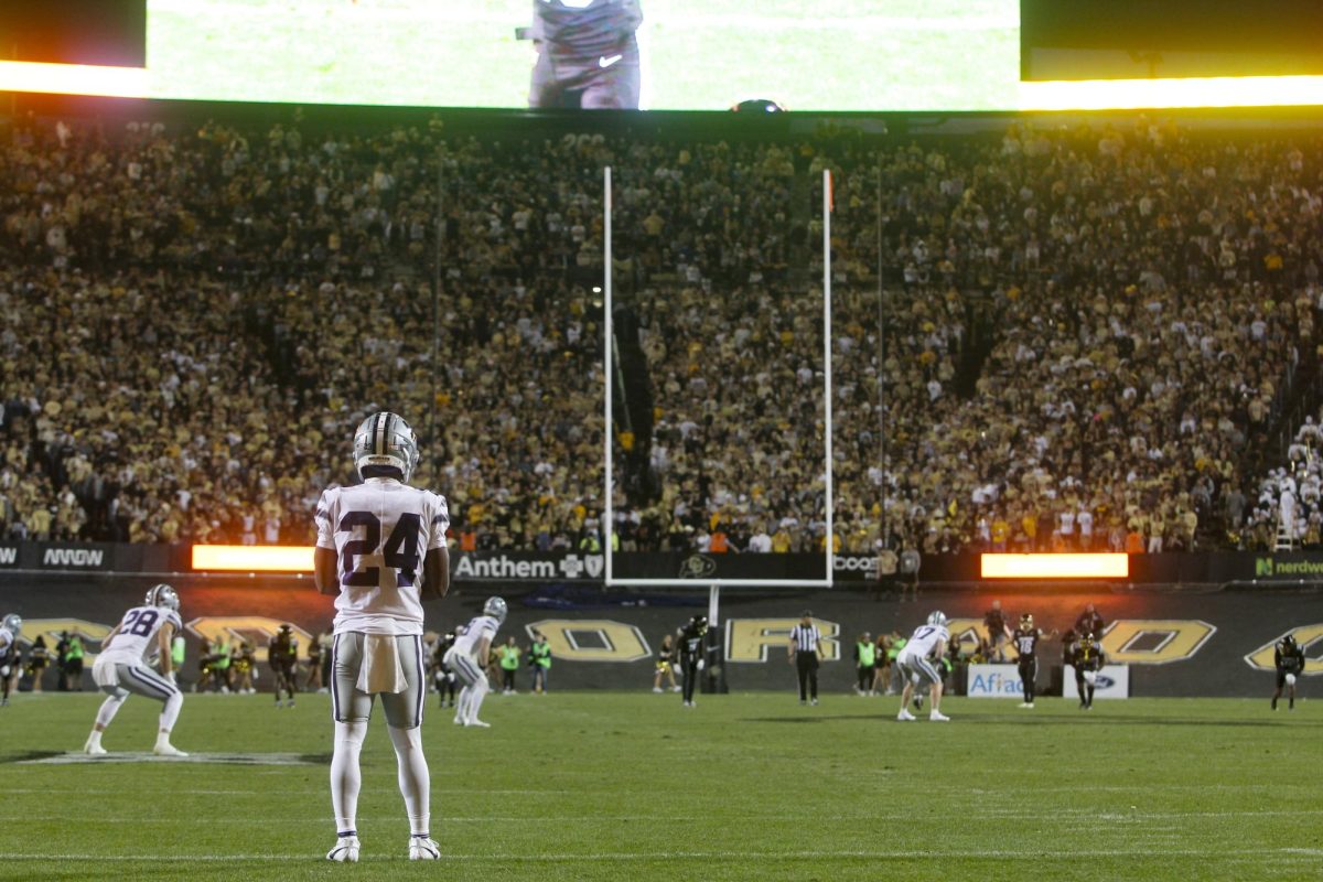 Kansas State running back, JB Price awaits the kickoff at the start of the second half.