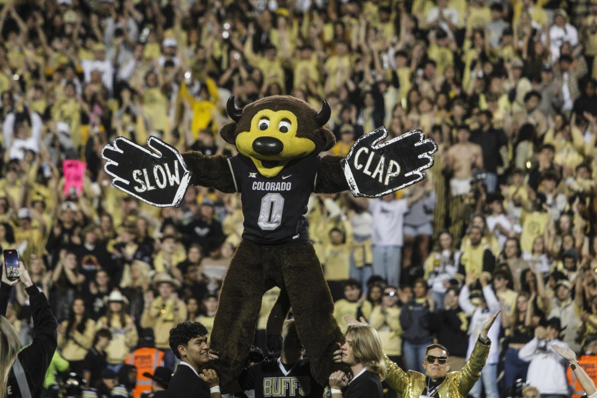 Chip the buffalo leads the crowd in a chant during halftime of CU's 31-28 loss to Kansas State.