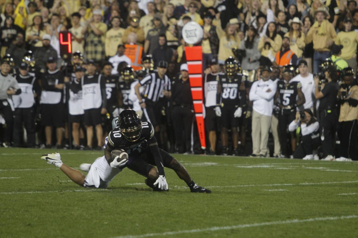 Wide Receiver, LaJohntay Wester gets brought down by a Kansas State defender after catching a pass for a first down.