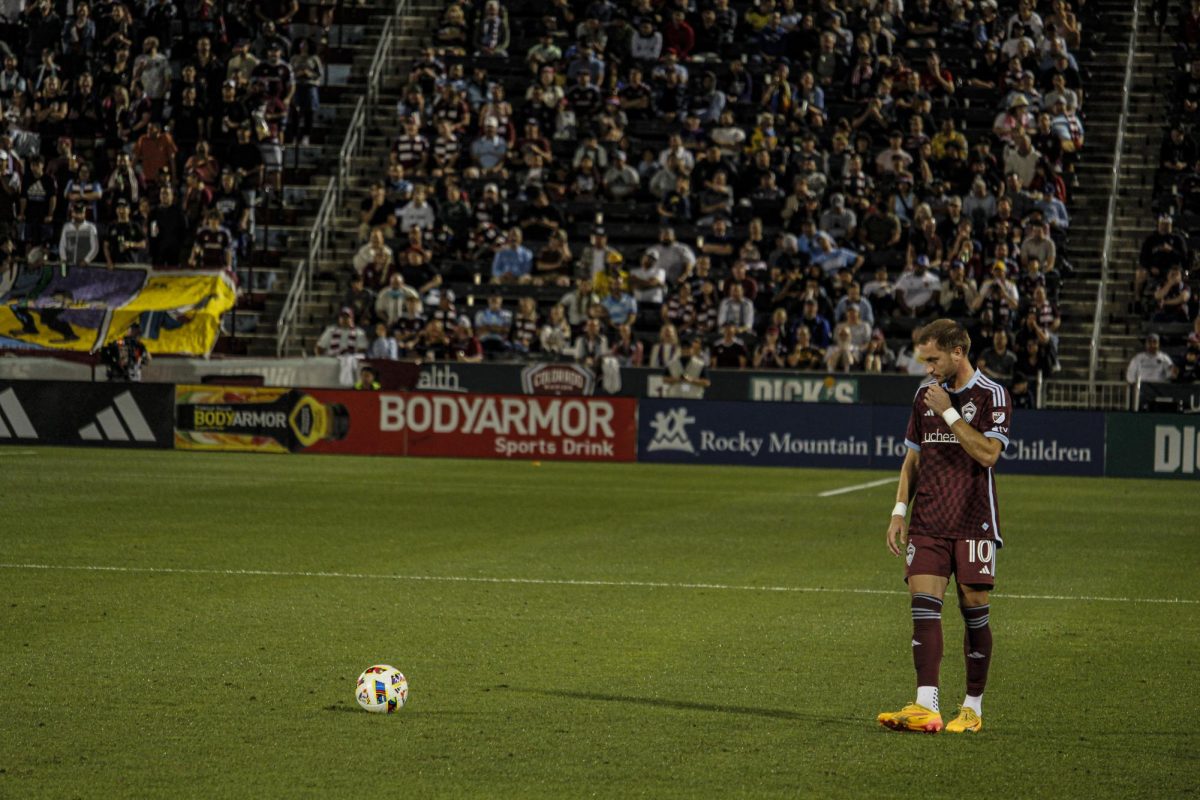 Midfielder, Djordje Mihailovic, prepares to kick the ball off from a free kick set piece. The Colorado Rapids struggled to capitalize on scoring opportunities and were relying on set piece plays to score against the LA Galaxy. The Colorado Rapids lost the game 1-3. 