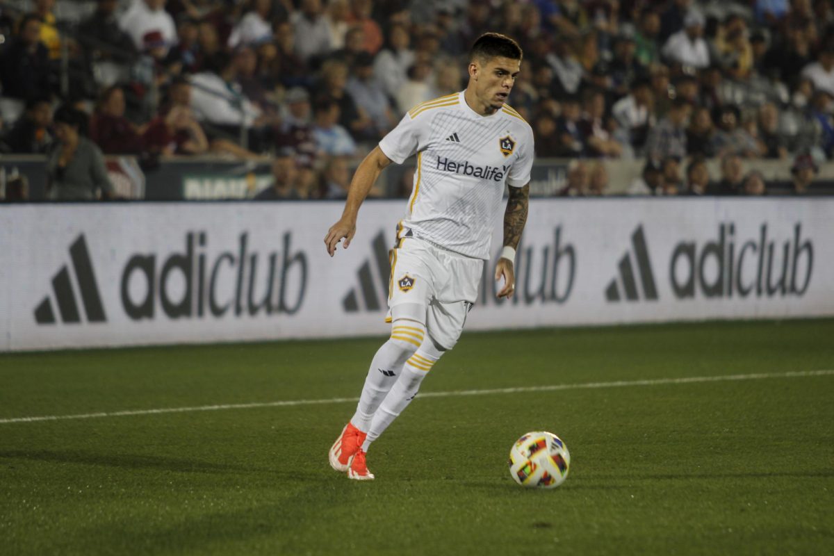 Forward, Gabriel Pec, analyzes the field before crossing the ball into the goalkeeper's box. LA Galaxy won 1-3 against the Colorado Rapids.