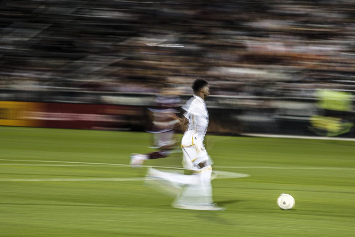 Defender, Emiro Garces, pushes the ball upfield at the start of the game against the Colorado Rapids. The first half was dominated by the Rapids and the Western Conference leaders LA Galaxy rebounded in the second half, scoring 3 unanswered goals leading to a 1-3 victory.