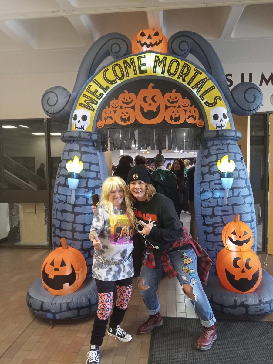 Kendra Hawkins and Sue Coons (from fitness center) excited to attend Halloween 2024 event at ACC.