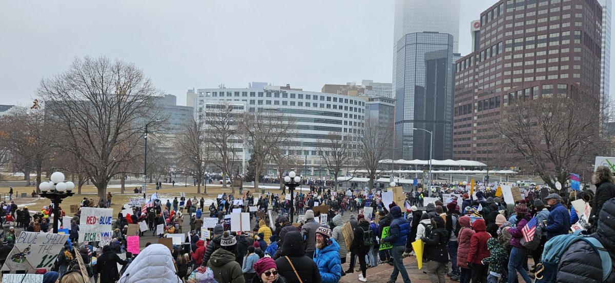 Protestors marching around Civic Center Park