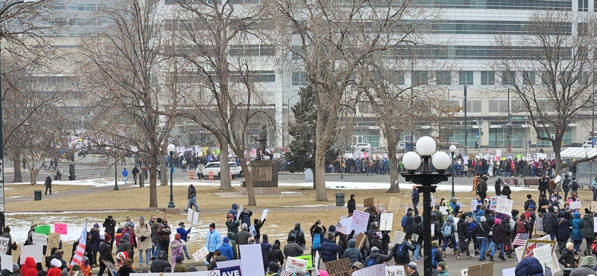 Protestors marching around Civic Center Park