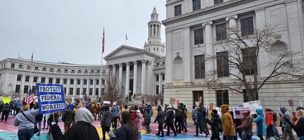 Protestors marching in front of Denver City and County Building