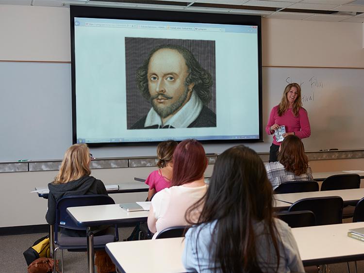 Professor Juliet Beckman teaching Shakespeare. Image taken from Arapahoe Community College's English Department.
