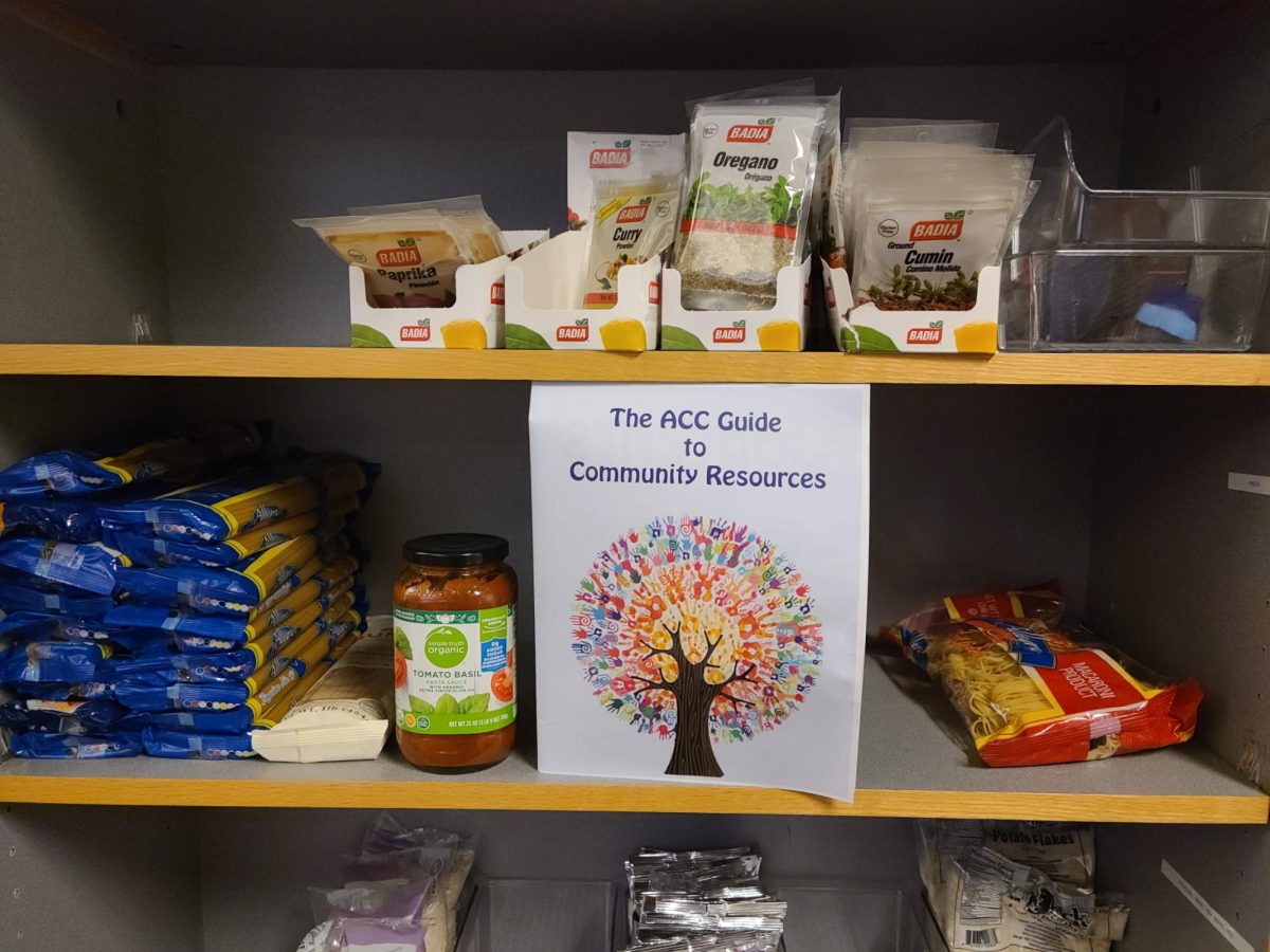 Pictured is The ACC Guide to Community Resources at the food pantry in the Dean of Students office