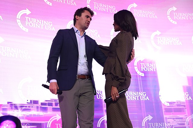 Charlie Kirk and Candace Owens speaking at a Turing Point USA event