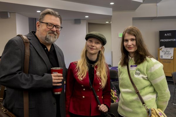 Author Teague Bohlen with ACC student Sophia Johnson and alum Riona Fryer.
